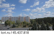 City view from the window of a multistory building in summer on a sunny day. Стоковое видео, видеограф Дмитрий Нечаев / Фотобанк Лори