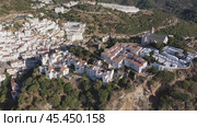 Aerial townscape of Casares, Malaga province, autonomous community of Andalusia, Spain. Стоковое видео, видеограф Яков Филимонов / Фотобанк Лори