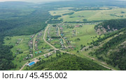 Южный Урал, Башкирия, село Ташла. Вид с воздуха. Southern Urals, Bashkiria, Tashla village. Aerial view. (2024 год). Стоковое видео, видеограф Евгений Романов / Фотобанк Лори