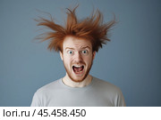 Indignant man with tousled red hair. Стоковое AI-изображение, AI-художник Дмитрий Киселёв / Фотобанк Лори