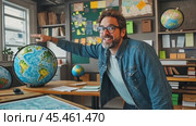 Geography teacher pointing at globe in classroom with world map on table. Стоковое AI-видео, аниматор Юрий Поздников / Фотобанк Лори