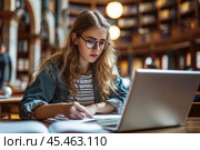 Happy Caucasian teen girl school or college student working on laptop doing homework or preparing for exam in library sitting at desk. Learning math and individual schoolwork concept, close up view. Стоковое AI-изображение, AI-художник Sergey Grishin / Фотобанк Лори