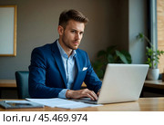 A businessman at his desk. Стоковое AI-изображение, AI-художник RamA / Фотобанк Лори