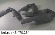 quadcopter screws broken and damaged after accident and collision, propeller blades for drone or quadcopter, Dolly Zoom 4K UHD. Стоковое видео, видеограф Куликов Константин / Фотобанк Лори