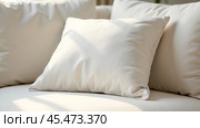 A cushion made of textured boucle fabric, against a background of other pillows. Стоковое AI-изображение, AI-художник Ольга Губская / Фотобанк Лори