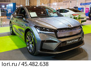 SKODA Enyaq iV Coupe electric car at ECAR SHOW - Hybrid and Electric Motor Show (2023 год). Редакционное фото, фотограф Дмитрий Рухленко / Фотобанк Лори