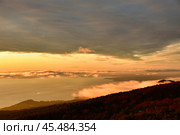 Sunset from Osorno Vulcan in winter refugio teskie views colorful orange blue. Стоковое фото, фотограф Andreas Muth-Hegener / Фотобанк Лори