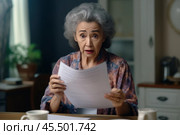 Ugly news. Distressed old age hispanic female check documents at home office read debt bankruptcy information in financial report. Upset stressed older latin woman get bad surprise in official letter. Стоковое AI-изображение, AI-художник Sergey Grishin / Фотобанк Лори