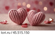 The banner. Background for Valentine's Day. Knitted hearts with festive lights in the form of a side in the background. a mock-up of an invitation card for a Valentine's Day party, a place to copy. Стоковое AI-изображение, AI-художник Photojuli / Фотобанк Лори