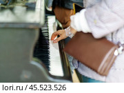Hands of a woman playing a street piano. Стоковое фото, фотограф Татьяна Степанищева / Фотобанк Лори
