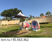 Urban sculpture in Ashdod park. Bench in the form of a fish in mosaic technique. Редакционное фото, фотограф Irina Opachevsky / Фотобанк Лори
