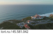Aerial around view of lighthouse at Cape Roca (2019 год). Стоковое видео, видеограф Михаил Коханчиков / Фотобанк Лори