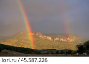 Double rainbow over mountains along Bakhchisaray highway in autumn, Bakhchisaray district, Republic of Crimea, Russia. Стоковое фото, фотограф Алексей Антипов / Фотобанк Лори