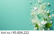 Homeopathic globules are elegantly arranged alongside a glass bottle filled with herbal solutions. The bright background enhances the natural setting for alternative medicine. Стоковое AI-изображение, AI-художник Sergey Grishin / Фотобанк Лори