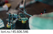 Soldering FPV Drone Motor Wires to ESC. Стоковое видео, видеограф Поскребышев Михаил / Фотобанк Лори