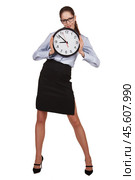Stylish woman with a round clock in hands. Стоковое фото, фотограф Дмитрий Киселёв / Фотобанк Лори