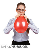 Stylish girl inflates a big red ball. Стоковое фото, фотограф Дмитрий Киселёв / Фотобанк Лори