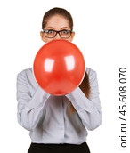 Girl inflating a large red balloon. Стоковое фото, фотограф Дмитрий Киселёв / Фотобанк Лори