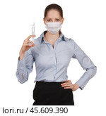 Woman in medical mask with syringe. Стоковое фото, фотограф Дмитрий Киселёв / Фотобанк Лори