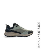 KRASNOYARSK, RUSSIA - December 1, 2024: Beige Merrell sneakers on a white background. Редакционное фото, фотограф Плотников Дмитрий / Фотобанк Лори