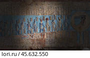 Hieroglyphic carvings and paintings on wall. Стоковое видео, видеограф Михаил Коханчиков / Фотобанк Лори
