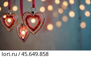 The concept of Valentine's Day, a banner with garlands in the form of hearts and magic lights for a holiday filled with love. A place for the text. Стоковое AI-изображение, AI-художник Photojuli / Фотобанк Лори