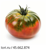 Colorful green and red heirloom tomato isolated on white background. Стоковое AI-изображение, AI-художник Иван Рябоконь / Фотобанк Лори