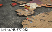 Spain - Travel concept with green pushpin on the world map. The location point on the map points to Madrid, the capital of the Spain. (2024 год). Стоковое видео, видеограф Андрей Армягов / Фотобанк Лори
