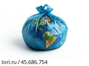 The globe, a symbol of our planet, is suffocated by a plastic bag. The photograph conveys the alarming concept of environmental pollution with plastic waste. The blue bag, a common household item, symbolizes the scale of the problem threatening the entire ecosystem. Стоковое AI-изображение, AI-художник Ярославский Максим / Фотобанк Лори