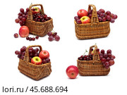Fresh fruit in a wicker basket on a white background. Стоковое фото, фотограф Ласточкин Евгений / Фотобанк Лори