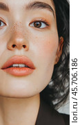 Closeup portrait of a woman expressing subtle emotions with natural freckles. Стоковое AI-видео, аниматор Sabyna75 / Фотобанк Лори