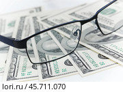 Black glasses and dollars. Стоковое фото, фотограф Дмитрий Киселёв / Фотобанк Лори