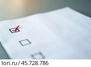 Voting form with a red check mark in the box. Presidential elections, government, referendum. Стоковое AI-изображение, AI-художник Коханова Наталья / Фотобанк Лори
