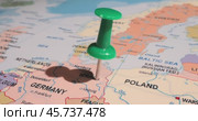 Germany - Travel concept with green pushpin on the world map. The location point on the map points to Berlin, the capital of the German. Стоковое видео, видеограф Андрей Армягов / Фотобанк Лори