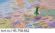 Hungary - Travel concept with green pushpin on the world map. The location point on the map points to Budapest the capital of the Hungary. Стоковое видео, видеограф Андрей Армягов / Фотобанк Лори