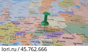 Austria - Travel concept with green pushpin on the world map. The location point on the map points to Vienna, the capital of the Austrian. Стоковое видео, видеограф Андрей Армягов / Фотобанк Лори