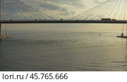 Aerial view of cable-stayed bridge during sunset. Стоковое видео, видеограф Михаил Коханчиков / Фотобанк Лори