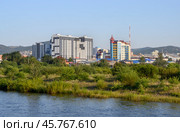ULAN-UDE,  RUSSIA - AUGUST 11, 2024. Modern buildings and construction on the banks of the Uda River in Ulan-Ude, Buryatia, Russia. Редакционное фото, фотограф Сергей Фролов / Фотобанк Лори