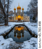 Ice hole (jordan, font) for bathing on Epiphany. Epiphany bathing is a tradition associated with the feast of the Epiphany of the Lord, which the Orthodox world celebrates on January 19. Стоковое AI-изображение, AI-художник Сергей Елизарьев / Фотобанк Лори