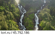 Latefossen is one of the most visited waterfalls in Norway and is located near Skare and Odda in the region Hordaland, Norway. Consists of two separate streams flowing down from the lake Lotevatnet. (2019 год). Стоковое видео, видеограф Андрей Армягов / Фотобанк Лори