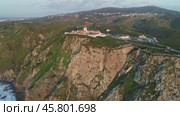 Aerial view of lighthouse at Cape Roca in Portugal (2019 год). Стоковое видео, видеограф Михаил Коханчиков / Фотобанк Лори