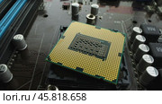 Modern processor and motherboard for a home computer. Стоковое видео, видеограф Андрей Армягов / Фотобанк Лори