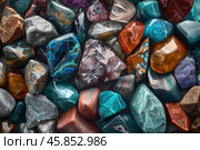 Colorful tumbled gemstones creating a vibrant and textured background. Стоковое AI-изображение, AI-художник Иван Рябоконь / Фотобанк Лори