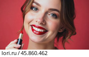 Smiling Woman With Bright Red Lipstick Posing Against Vibrant Red Backdrop in a Cheerful Atmosphere. Стоковое AI-видео, аниматор Sergey Grishin / Фотобанк Лори