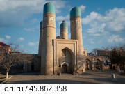 Madrasah of Khalif Niyaz-kul (Chor Minor) is a Central Asian madrasah in the historical center of Bukhara on a sunny day, Bukhara, Uzbekistan. Стоковое фото, фотограф Ula Ulachka / Фотобанк Лори