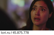 Young woman crying with tears streaming down her face. Стоковое видео, видеограф Данил Руденко / Фотобанк Лори