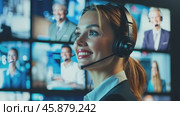 Security operator smiling and working on multiple screens. Стоковое AI-видео, аниматор Юрий Поздников / Фотобанк Лори