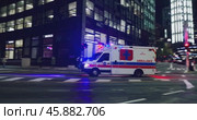 an ambulance with flashing lights and a siren drives along a night city street. Стоковое AI-видео, аниматор Александр Довянский / Фотобанк Лори