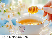Чай с медом. Стоковое AI-изображение, AI-художник Щеголева Ольга / Фотобанк Лори