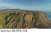 Aerial view of lighthouse at Cape Roca in Portugal (2019 год). Стоковое видео, видеограф Михаил Коханчиков / Фотобанк Лори